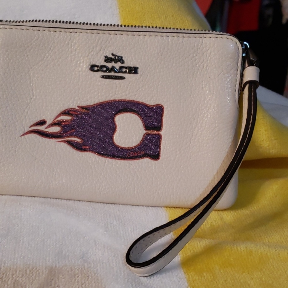Coach motif leather wristlet